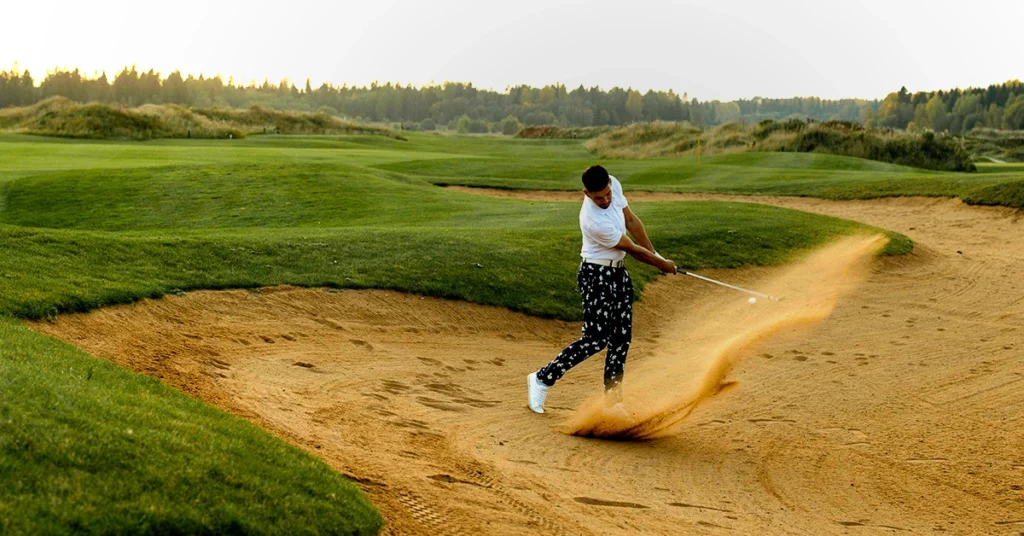 Can you use a pitching wedge in the sand?